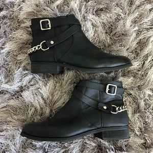 Black ankle boots with chain